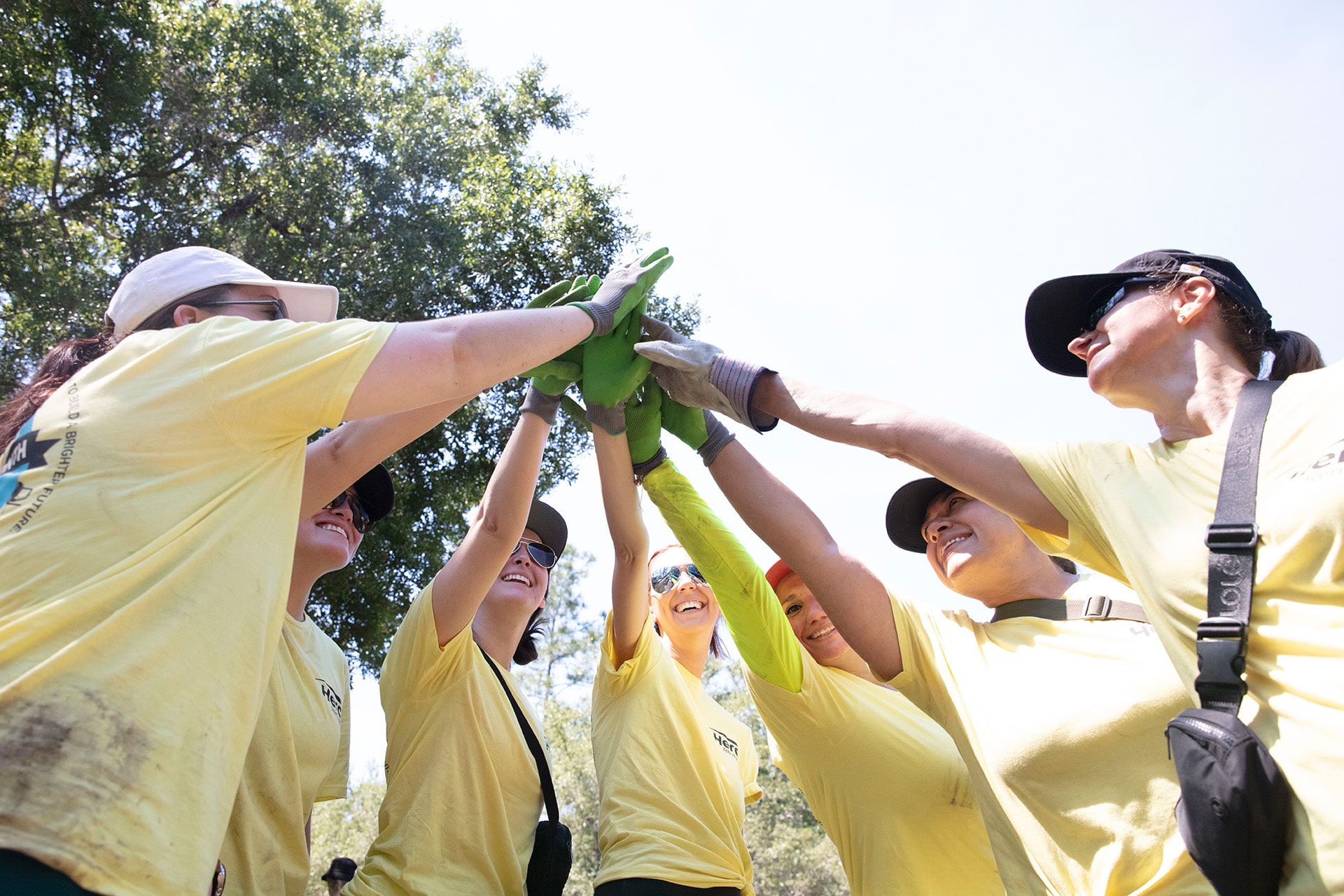 Team putting their hands together