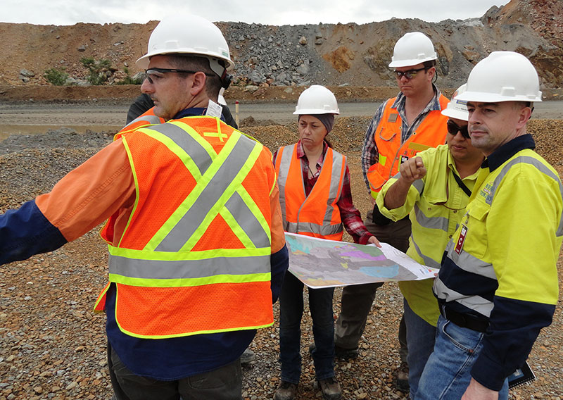 Moroney (center) at the Pueblo Viejo mine in the Dominican Republic.