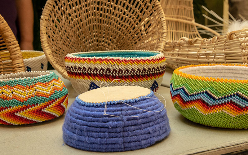Students participate in traditional Shoshone hand games. “Our culture is connected to the language and sweat lodges,” says Anthony Maggio (pictured in bandana). “You can’t separate them.”