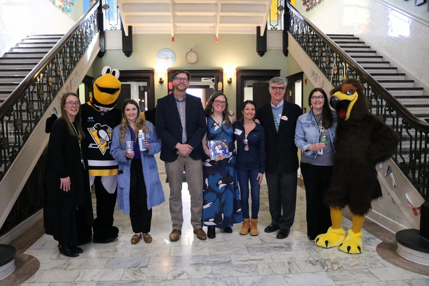 On Global Recycling Day, PPG, the Pittsburgh Penguins, Can Manufacturers Institute (CMI), Recycling is Like Magic! and Mon-Valley Recycling Center celebrate local second graders for their recycling efforts at Environmental Charter School (ECS)